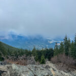 Foggy summit overlook from Mount Si trail in Washington State.