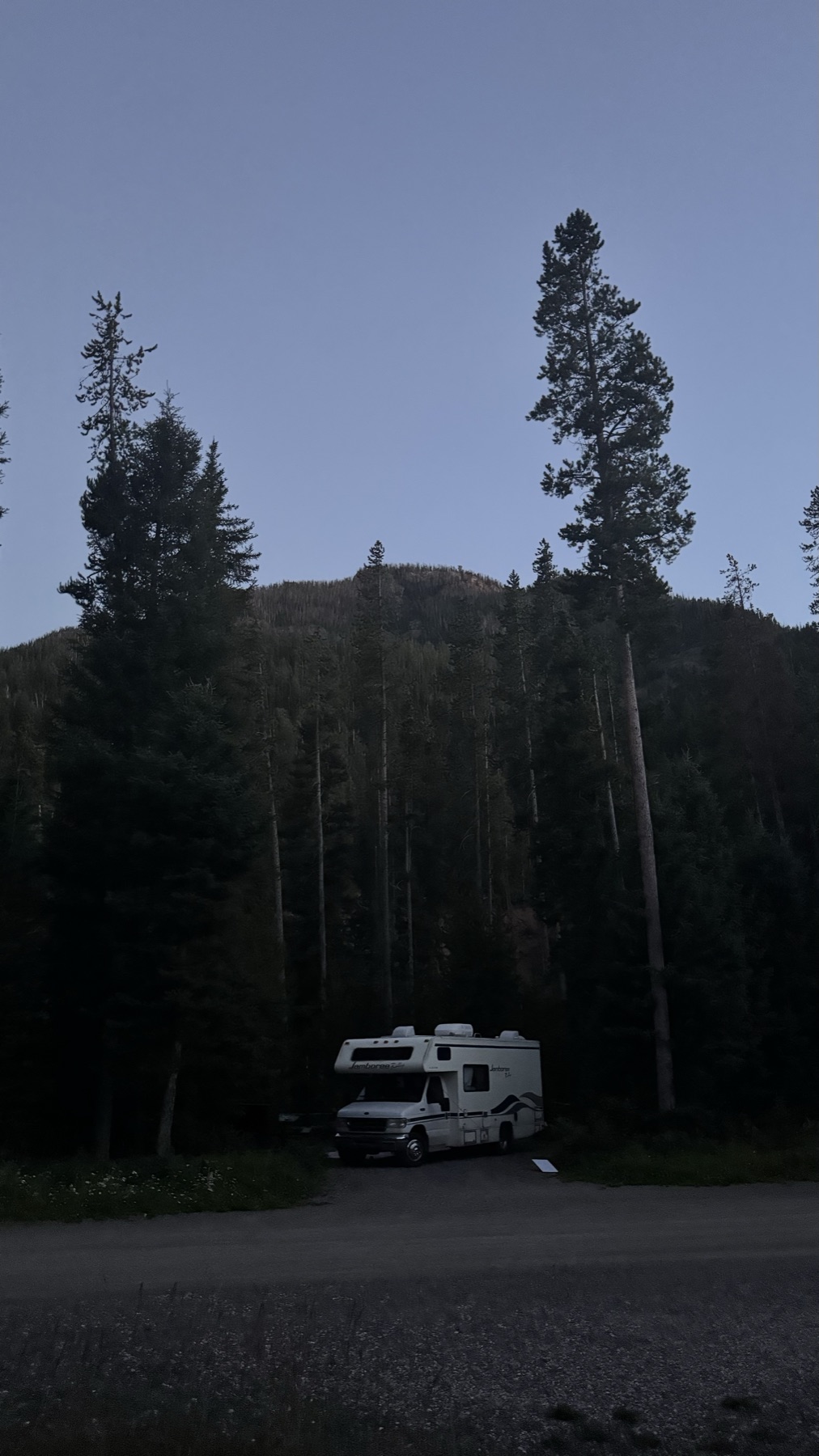 Our RV parked at a forest campground near Yellowstone National Park